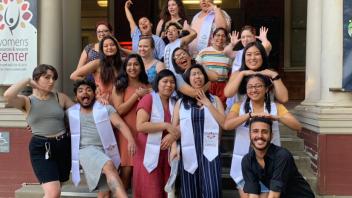 Funny photos of WRRC Scholars in their stoles on the front steps of the WRRC